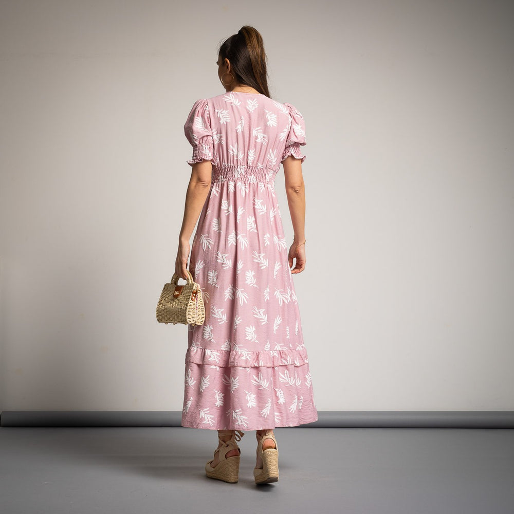 Romantic blush pink midi summer dress with leaf pattern, back view with smocked waist
