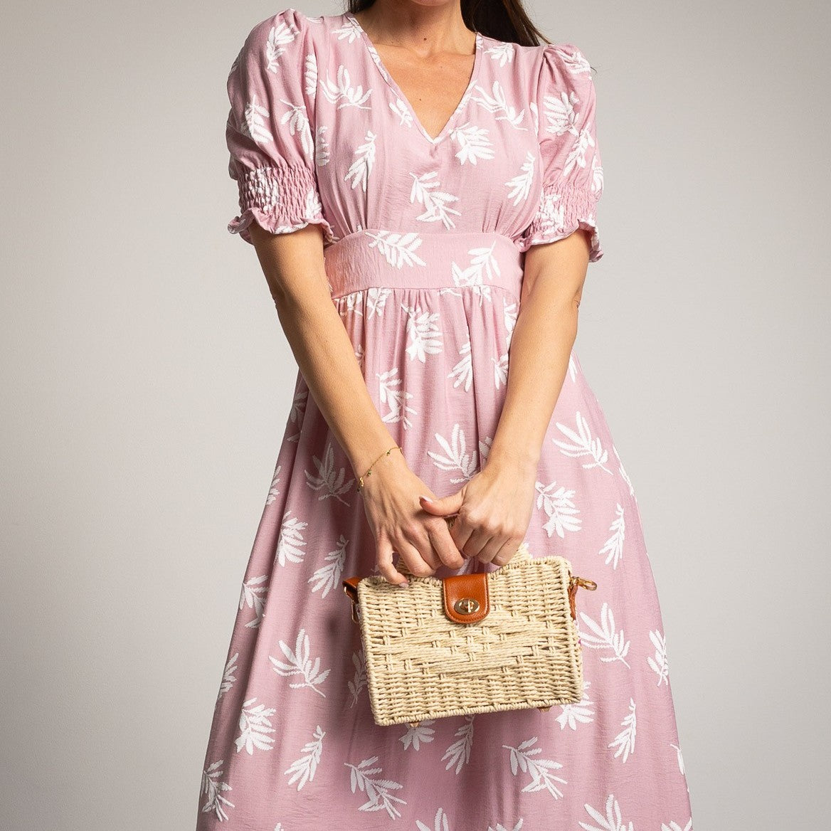Romantic blush pink midi summer dress with leaf pattern and puff sleeves, front view