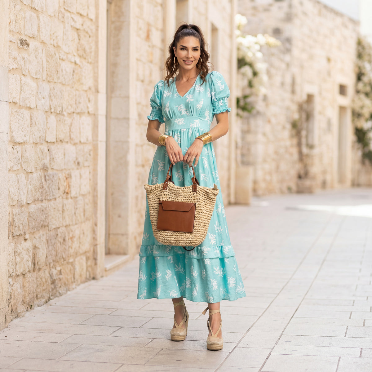 Romantic mint green midi summer dress with leaf pattern styled outdoors, feminine summer look