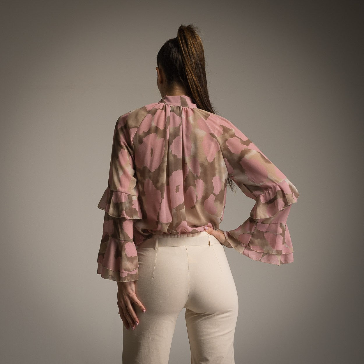Back view of rose watercolour ruffle sleeve blouse