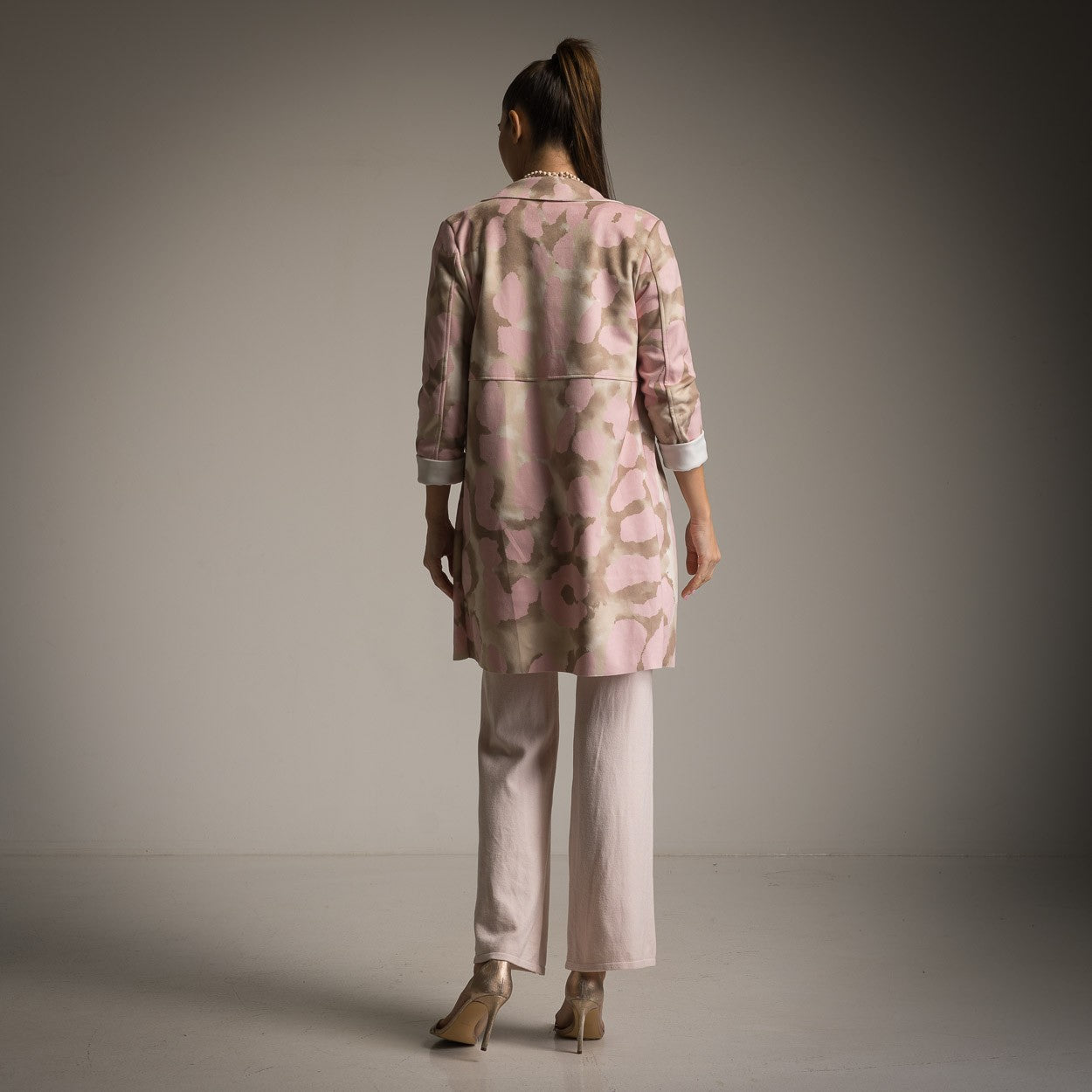Back view of rose watercolour suede jacket