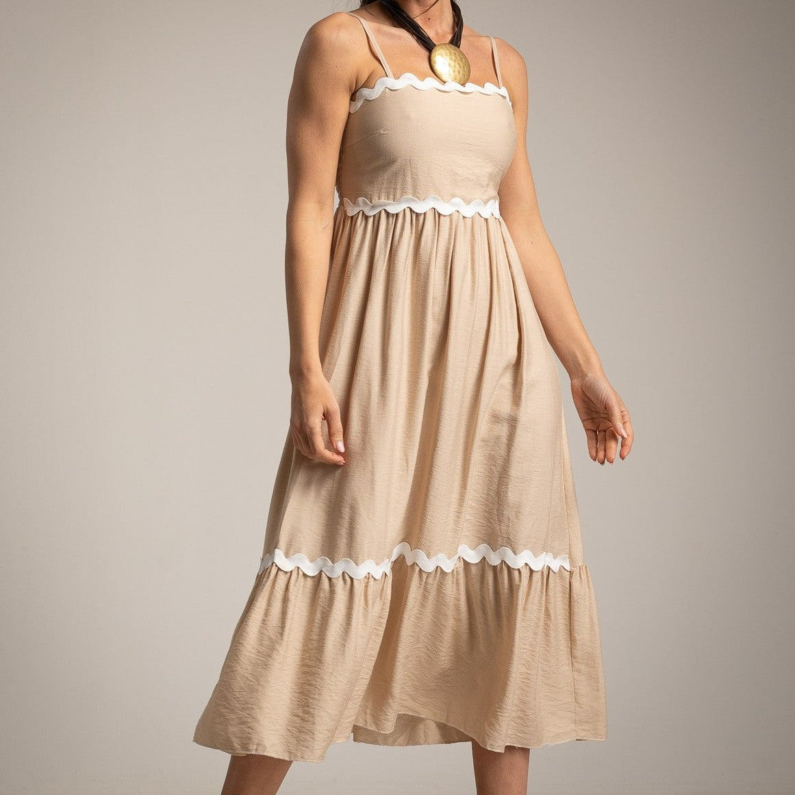 Soft Sand midi dress with white contrast trim and delicate shoulder straps