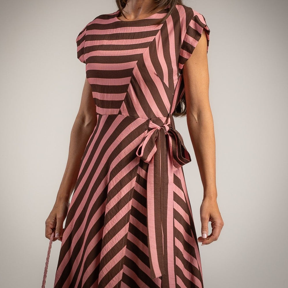 Close up of striped midi dress in dusty rosewood with side waist tie detail