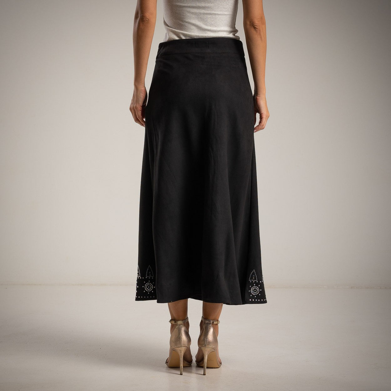 Black suede midi skirt with rhinestone details back view