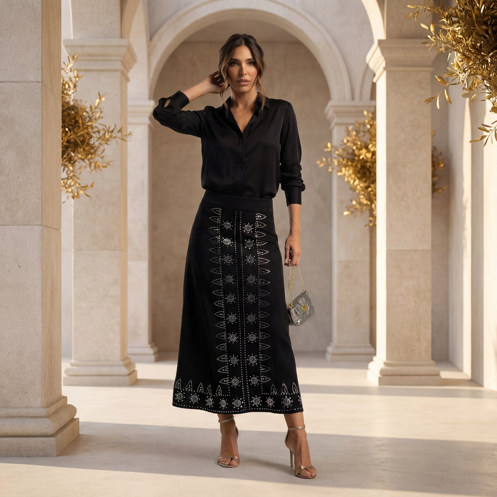 Suede midi skirt with rhinestone details styled for elegant outfit