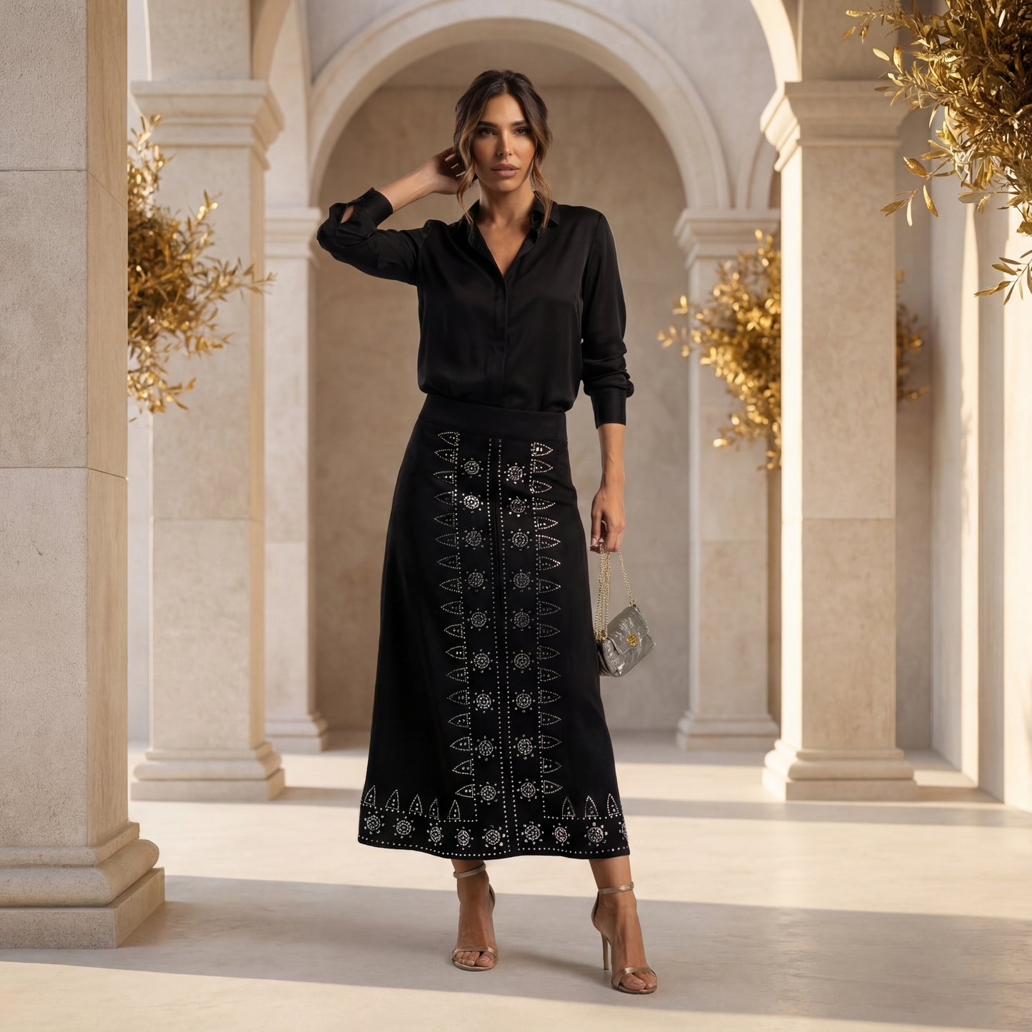 Suede midi skirt with rhinestone details styled for elegant outfit