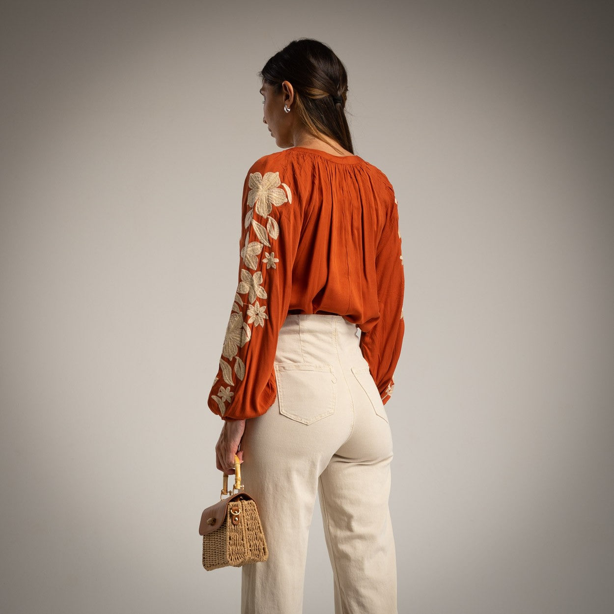 Teja embroidered blouse back view with floral sleeve embroidery