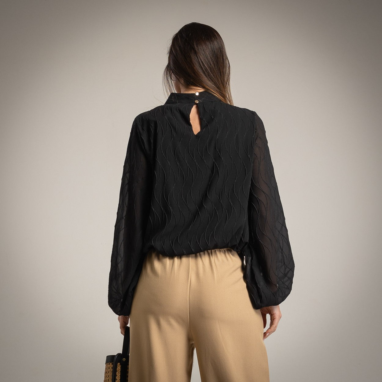 Back view of black textured wave blouse with sheer sleeves – MARIΓIOÚ
