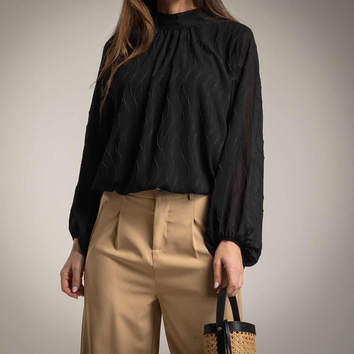 Front view of black textured wave blouse styled elegantly – MARIΓIOÚ