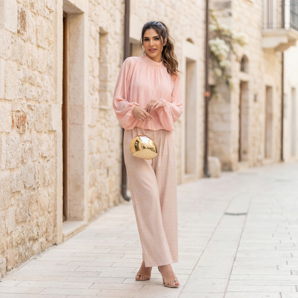 Full body look of rose textured wave blouse styled with trousers – MARIΓIOÚ