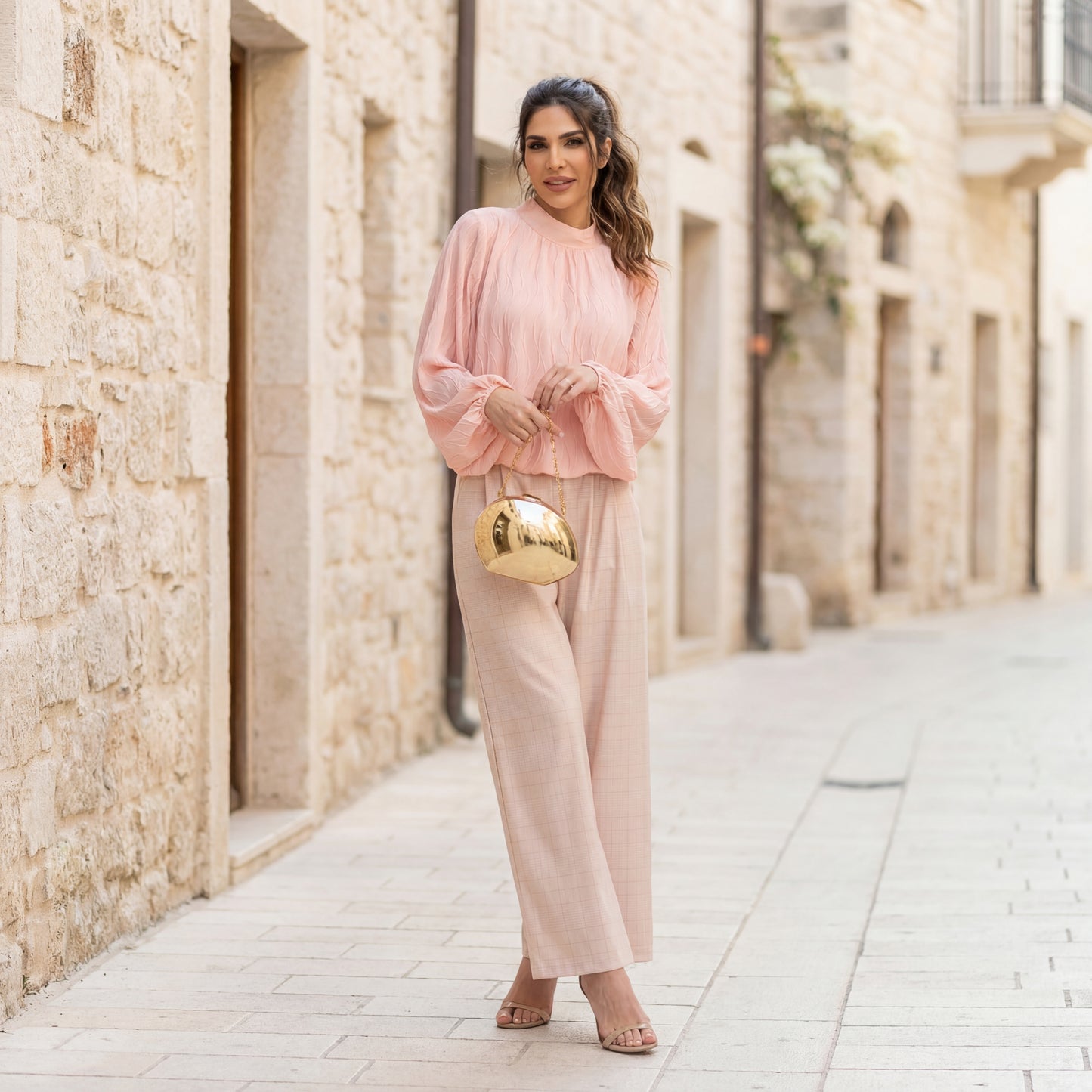 Full body look of rose textured wave blouse styled with trousers – MARIΓIOÚ