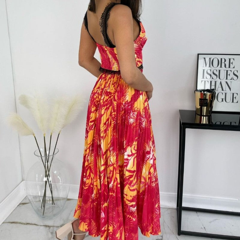Tropical two piece set in sunset red back view with flowy skirt