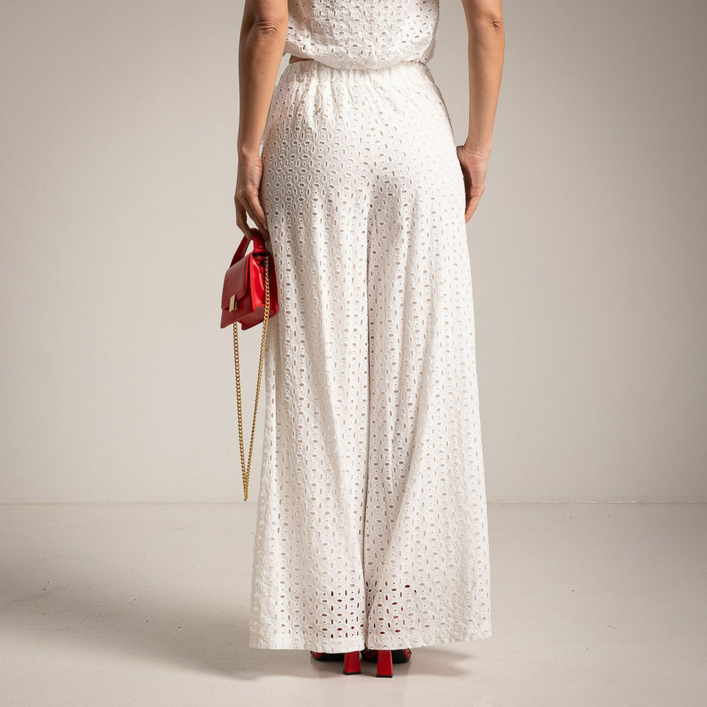 White broderie anglaise wide leg pants with elastic waistband and sleeveless top back view